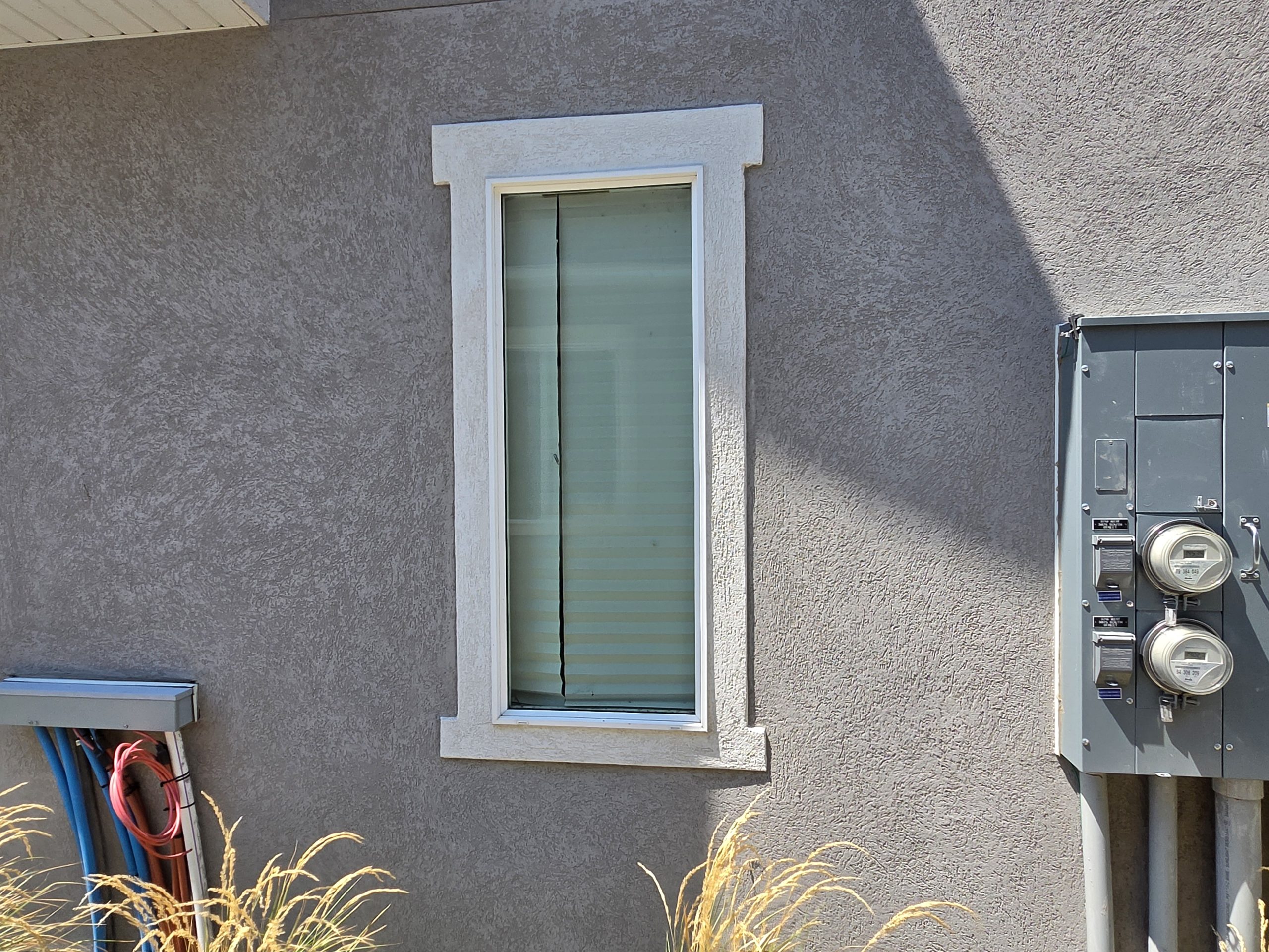 Clean window near the electric meters