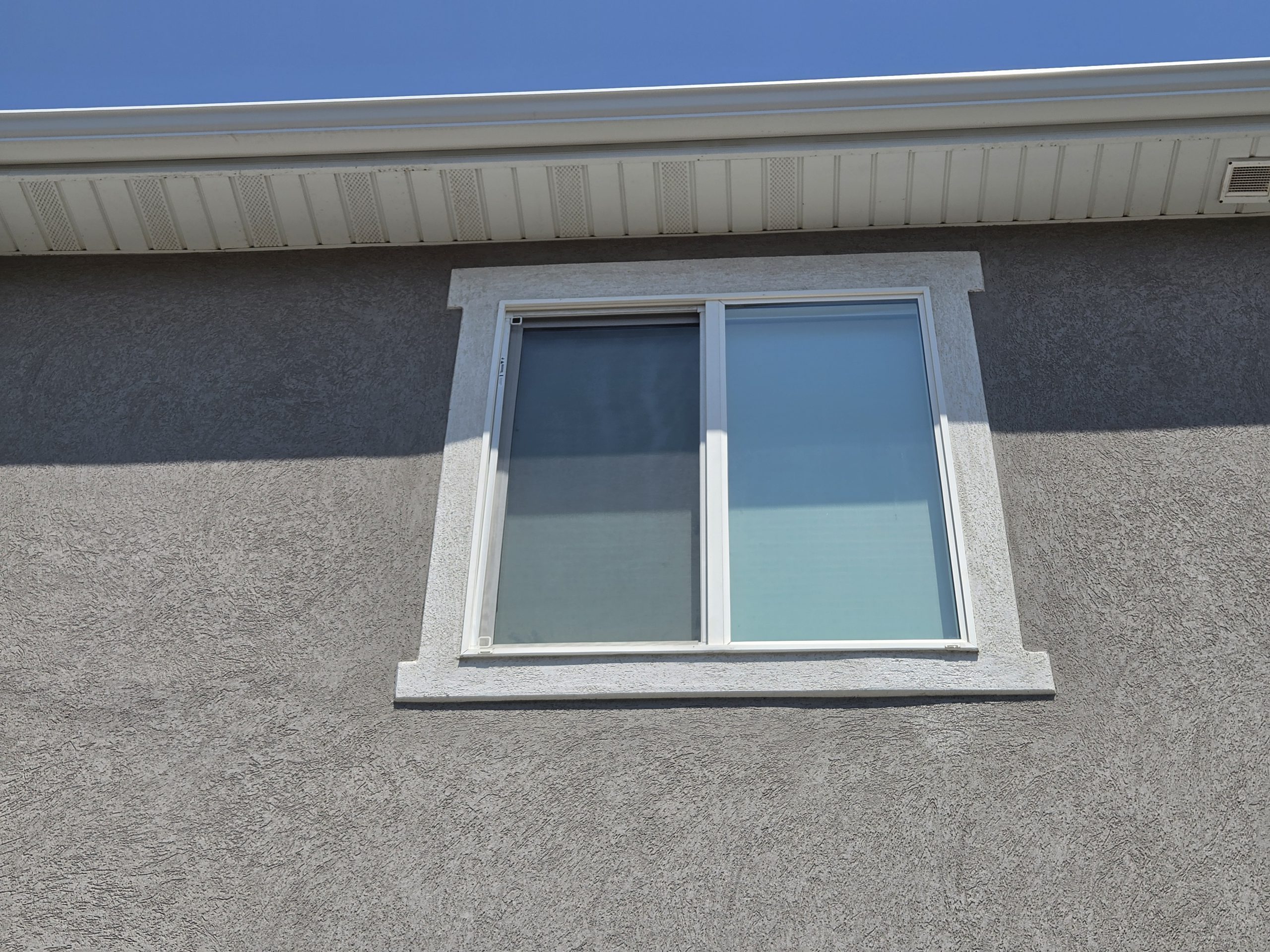 Split window showing the clean pane next to the still-dusty pane before washing